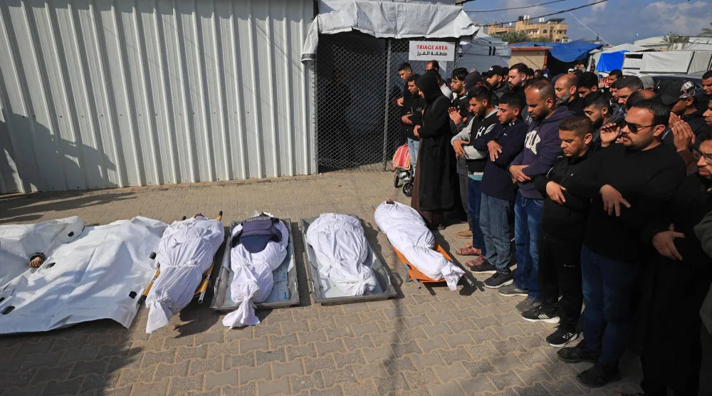 جثث القتلى الفلسطينيين في غزة (أ.ف.ب)