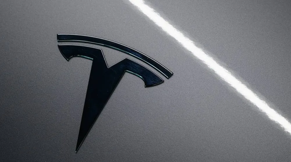 01 September 2025, Brandenburg, Gruenheide: The Tesla logo is seen on a vehicle at the Tesla Gigafactory Berlin-Brandenburg. (dpa)