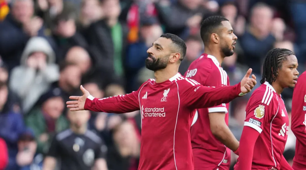 صلاح محتفلاً بالهدف (أ.ب)