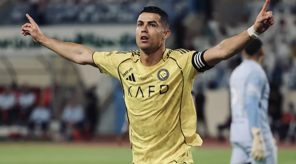 رونالدو محتفلاً بهدفه في الأخدود (موقع نادي النصر)