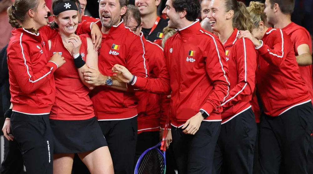 المنتخب البلجيكي يحتفل بالفوز على الولايات المتحدة (أ.ف.ب)