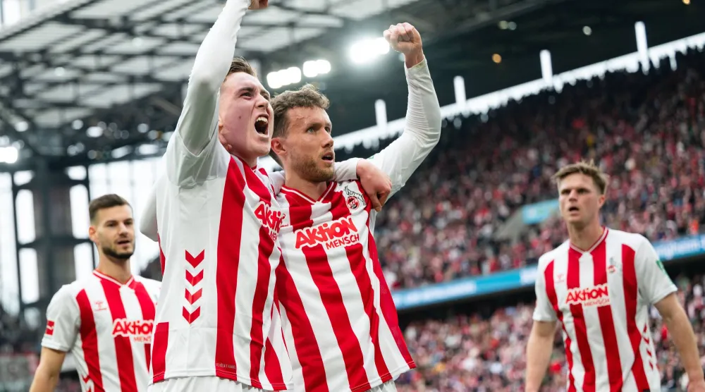 فرحة لاعبي كولن تكررت 3 مرات أمام بريمن (أ.ب)