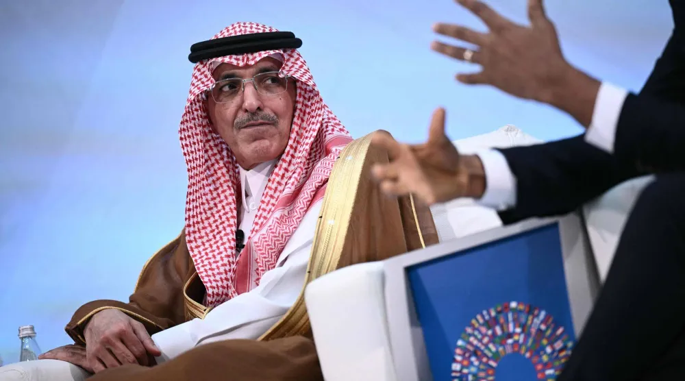 الجدعان مشاركاً في اجتماعات الخريف (أ.ف.ب)