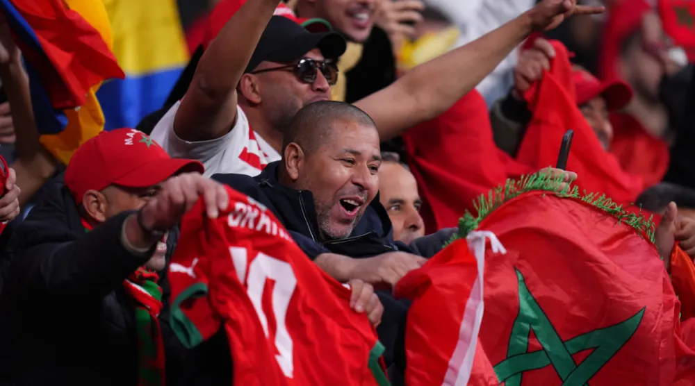 Moroccan fans cheer during a friendly soccer match between Morocco and Ecuador in Madrid, Spain, Friday, March 27, 2026. (AP Photo/Manu Fernandez)