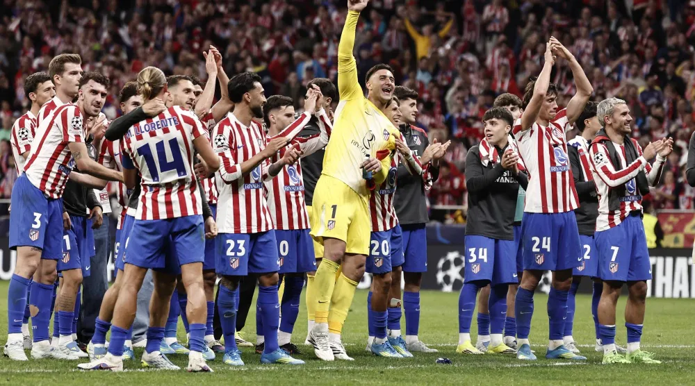 يعيش مشجعو أتلتيكو مدريد فترة مثالية في الوقت الحالي (إ.ب.أ)