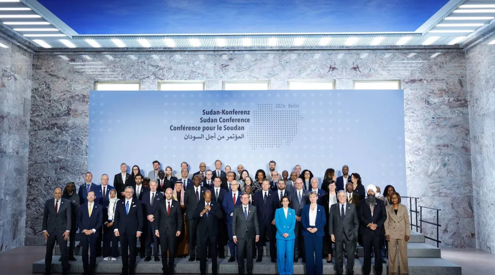 المشاركون في المؤتمر الدولي بشأن السودان الذي استضافته العاصمة الألمانية برلين يوم الأربعاء (أ.ف.ب)