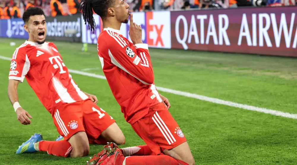 أوليسيه محتفلا بهدفه الرائع في ريال مدريد (إ.ب.أ)