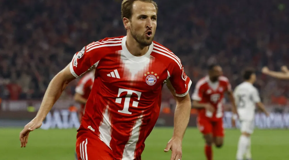 كين محتفلا بهدفه في الريال (رويترز)