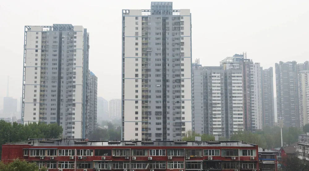 مباني الشقق السكنية في بكين (إ.ب.أ)