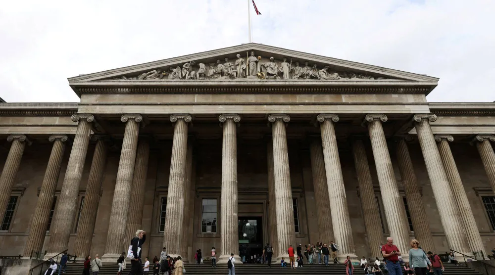 FILE PHOTO: People walk in front of the British Museum in London, Britain, September 28, 2023. REUTERS/Hollie Adams/File Photo