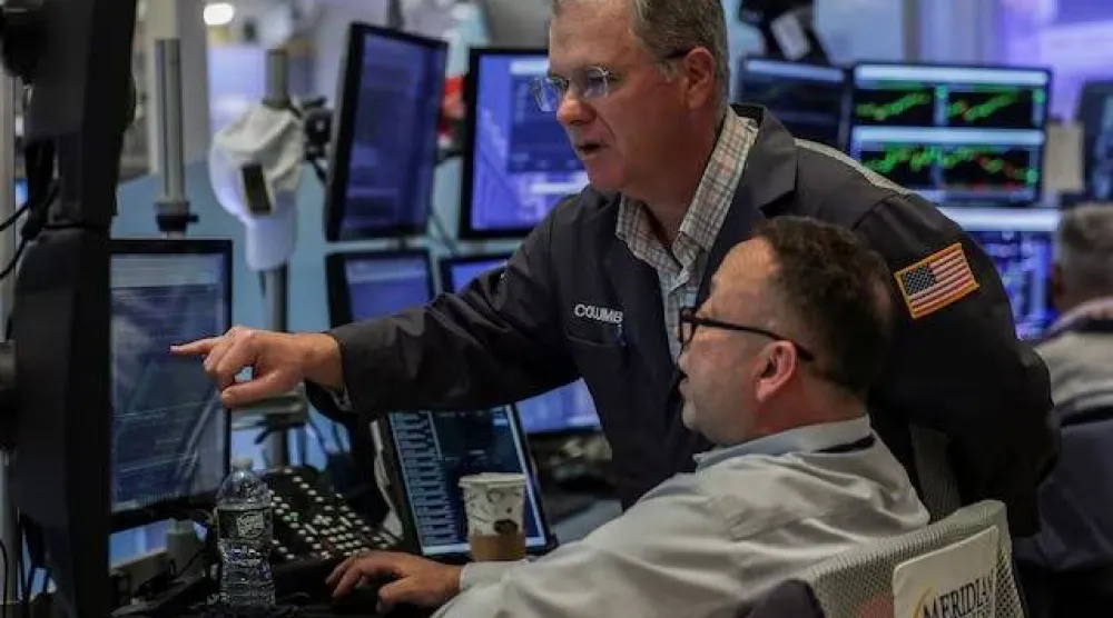 متداولون في بورصة نيويورك (رويترز)