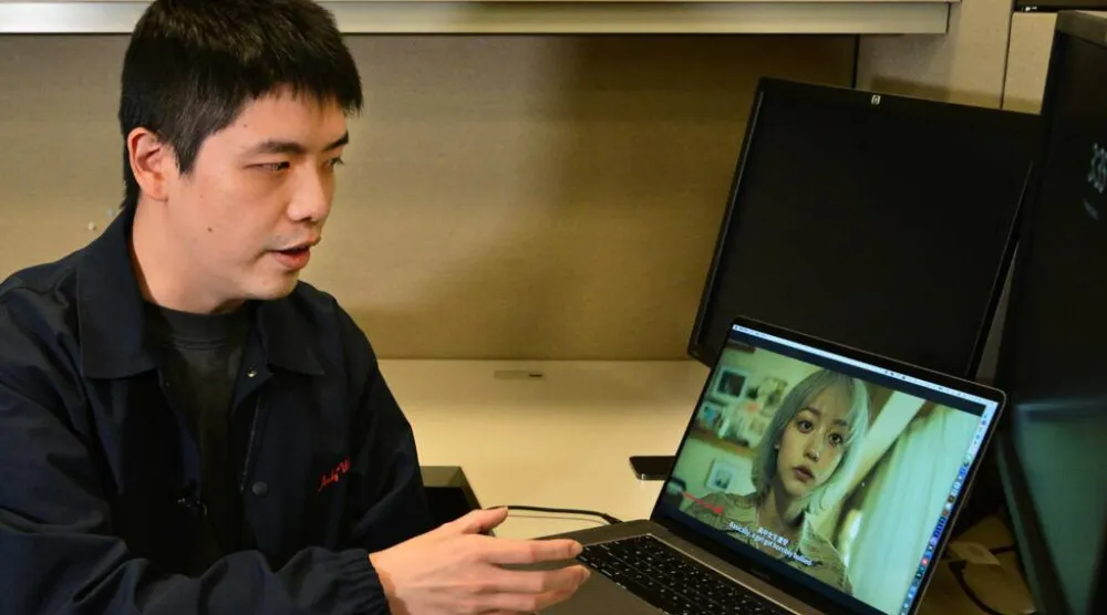 انتشرت في الصين مؤخراً ظاهرة تعرف بـ«البشر الرقميين» (أ.ف.ب)