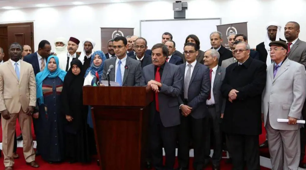 أعضاء بالهيئة الدستورية لصياغة الدستور الليبي خلال مؤتمر صحافي في عام 2014 (الصفحة الرسمية للهيئة)