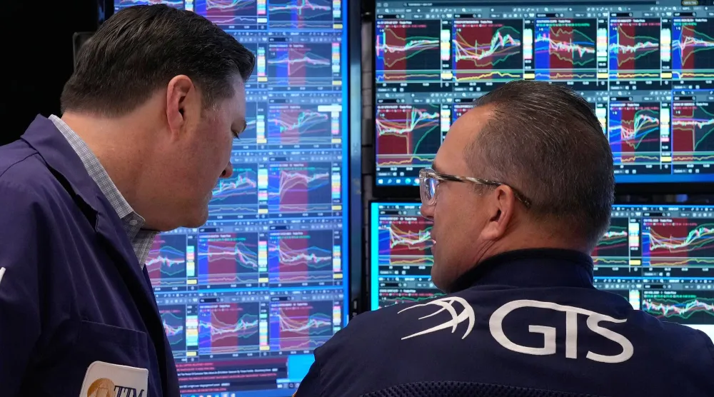 متداولون يعملون في بورصة نيويورك (أ.ب)