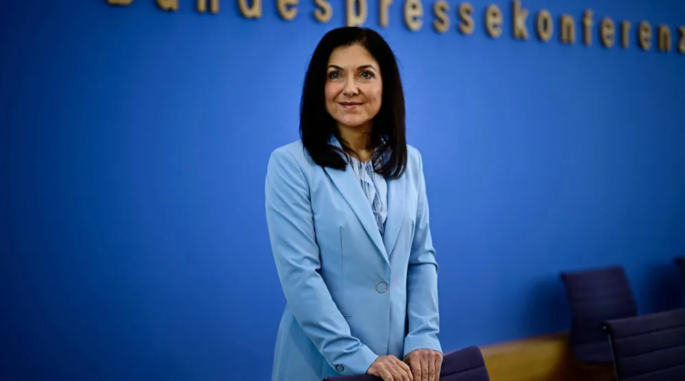 وزيرة الاقتصاد كاترينا رايش تعرض توقعات الحكومة لربيع هذا العام (أ.ف.ب)