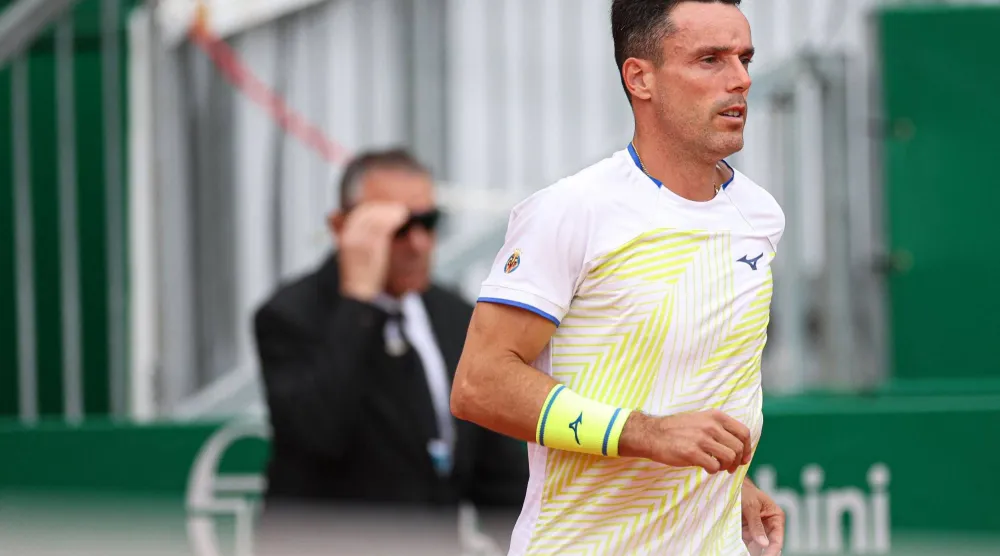 لاعب التنس الإسباني روبرتو باوتيستا أغوت (أ.ف.ب)