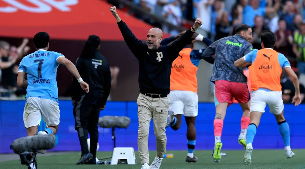 هل تحقيق غوارديولا للثلاثية المحلية هذا الموسم ستدفعه لرحيل عن سيتي وهو بالقمة؟ (رويترز)
