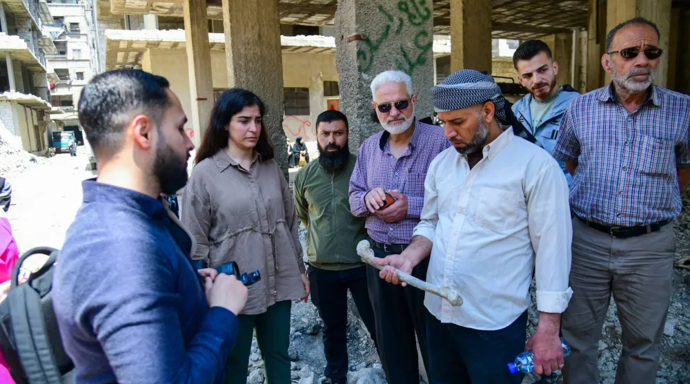 فحص الأدلة والبقايا البشرية الناتجة عن مجزرة التضامن عام 2013 في الحي الدمشقي الثلاثاء (هيئة العدالة الانتقالية)