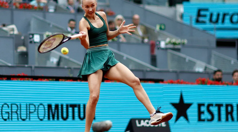 Austria's Anastasia Potapova returns the ball to Czech Republic's Karolina Pliskova during their 2026 WTA Tour Madrid Open tennis tournament singles match at the Caja Magica in Madrid, on April 29, 2026. (Photo by OSCAR DEL POZO / AFP)