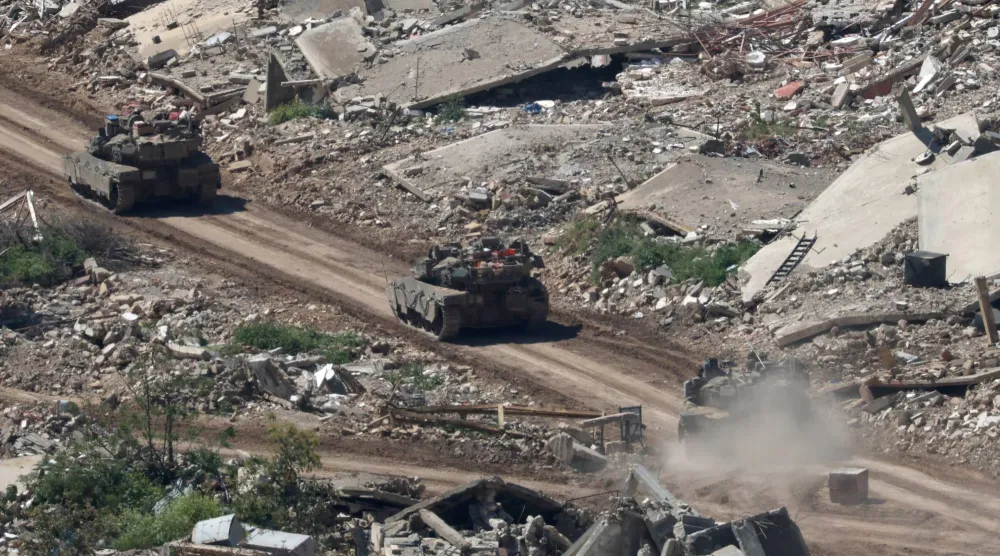 Israeli military vehicles maneuver on the Lebanese side of the border, as seen from the Upper Galilee in northern Israel, 29 April 2026, amid a ceasefire between Israel and Lebanon.  EPA/ATEF SAFADI