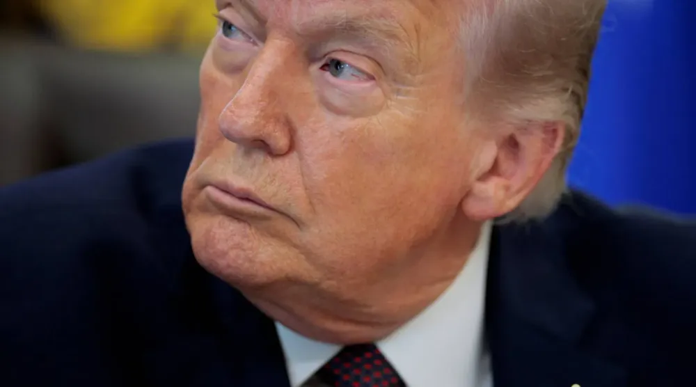 US President Donald Trump attends the signing ceremony for an executive order on mail ballots, in the Oval Office of the White House in Washington, DC, March 31, 2026. (Reuters)