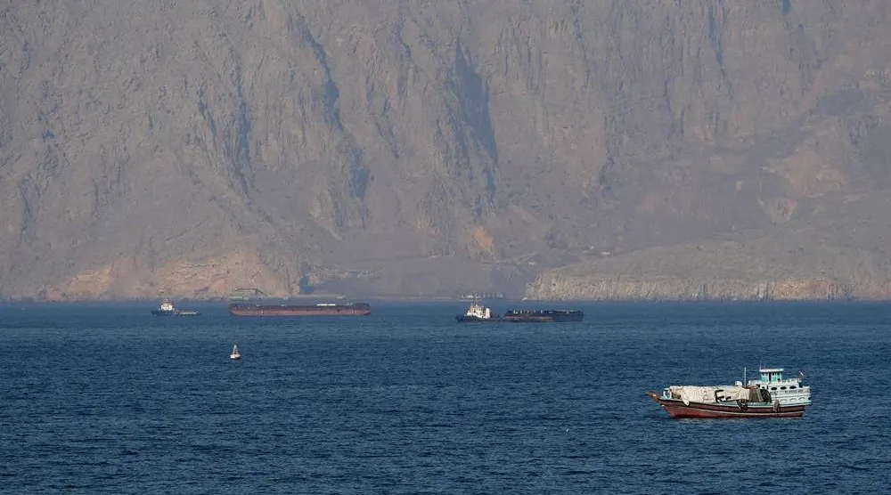 Ships and tankers in the Strait of Hormuz off the coast of Musandam, Oman, April 18, 2026. (Reuters)