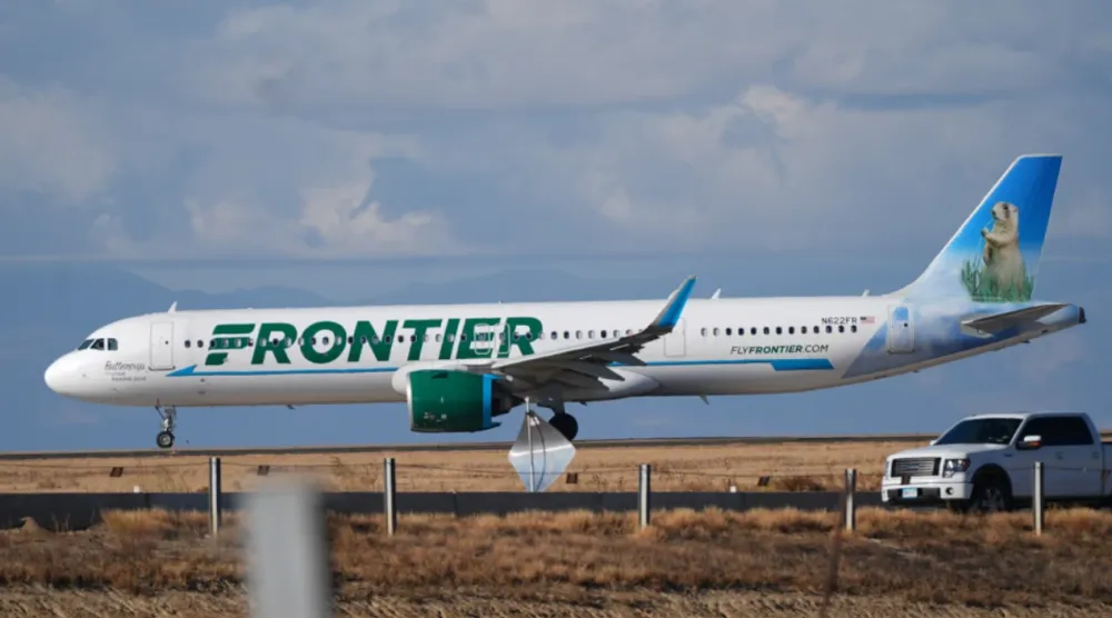 A Frontier Airlines jetliner taxis down a runway for take off from Denver International airport on Nov. 25, 2025, in Denver. (AP Photo/David Zalubowski, File)

