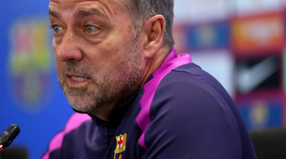  Barcelona's German coach Hans-Dieter Flick gives a press conference on the eve of the Spanish league football match between FC Barcelona and Real Madrid CF at Camp Nou Stadium in Barcelona on May 9, 2026. (AFP)