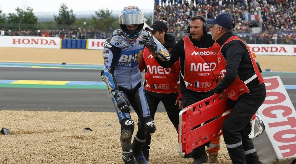 Gresini Racing MotoGP rider Alex Marquez of Spain is helped after crashing during the MotoGP race at the French Motorcycling Grand Prix in Le Mans, France, 10 May 2026. (EPA)