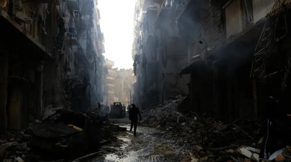 2014'te Halep'in varil bombalarıyla bombalanmasının yol açtığı yıkım (Reuters)