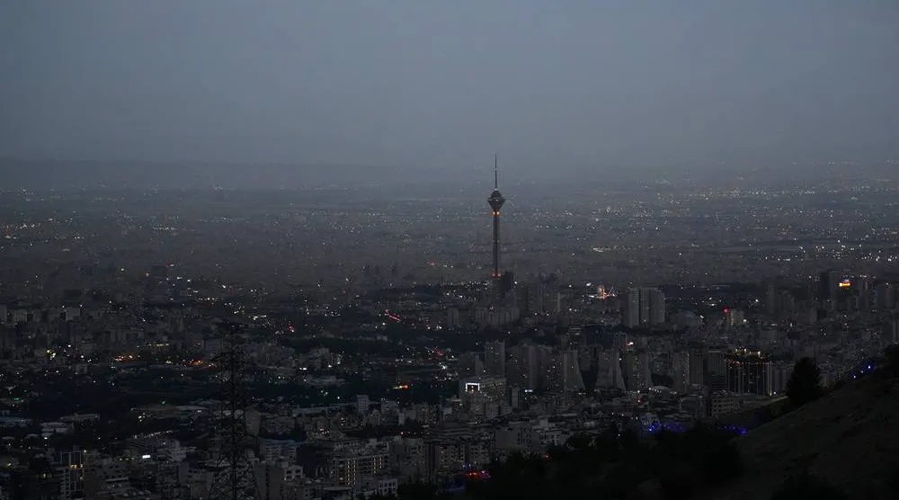  Night falls over the city and the Milad Tower in Tehran, Iran, Friday, May 15, 2026. (AP)