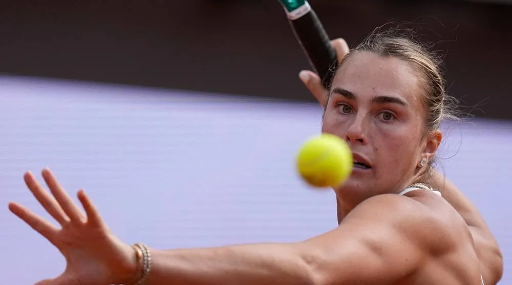  Belarus' Aryna Sabalenka returns the ball to Romania's Sorana Cirstea during their match at the Italian Open tennis tournament in Rome, Saturday, May 9, 2026. (AP) 