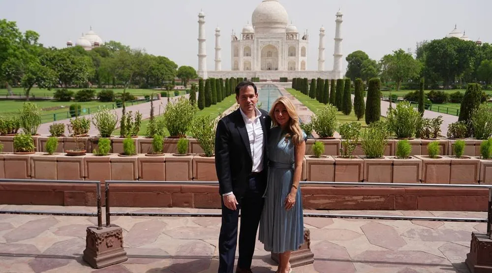 United States Secretary of State Marco Rubio poses with his wife, Jeanette Rubio, during their visit to the Taj Mahal in Agra, India, Monday, May 25, 2026. Pool via Reuters