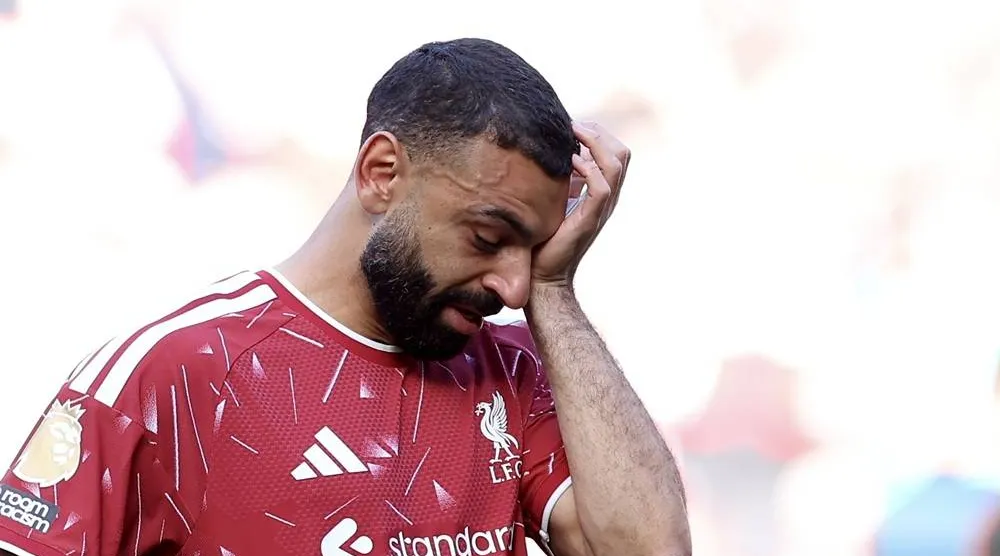 Liverpool's Mohamed Salah reacts after his final match in a Liverpool shirt after the English Premier League match Liverpool FC against Brentford FC, in Liverpool, Britain, 24 May 2026. (EPA) 