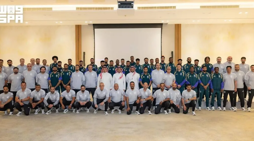Saudi Minister of Sport and President of the Saudi Olympic and Paralympic Committee Prince Abdulaziz bin Turki bin Faisal and the Saudi national team and accompanying staff sit for a family before the team's departure to the US. (SPA)