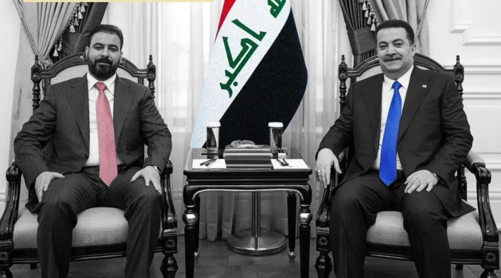Görev süresi sona eren Irak Başbakanı Muhammed Şiya es-Sudani ve Başbakan adayı Ali el-Zeydi, Bağdat'taki Hükümet Sarayı'nda, 27 Nisan 2026 (Reuters)