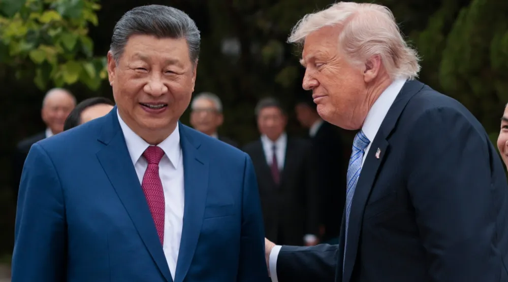 US President Donald Trump, right, speaks with Chinese President Xi Jinping while leaving after a visit to the Zhongnanhai Garden in Beijing, Friday, May 15, 2026. (Evan Vucci/Pool Photo via AP) 