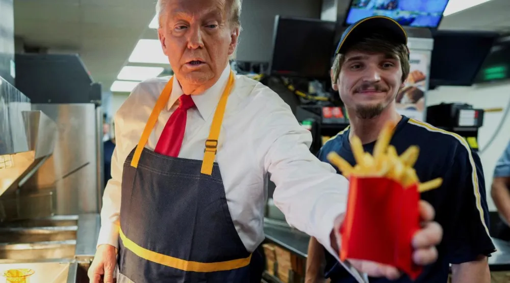 McDonald's hayranı Trump, işçi sınıfındaki seçmenleriyle yakınlık kurmak için beslenme tercihlerini kullanmıştı (Reuters)