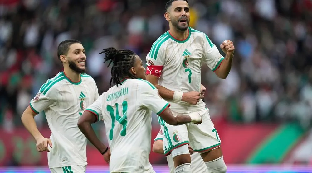 Algeria's Riyad Mahrez celebrates after scoring his side's second goal during the Africa Cup of Nations group E match between Algeria and Sudan in Rabat, Morocco, Wednesday, Dec. 24, 2025. (AP) 