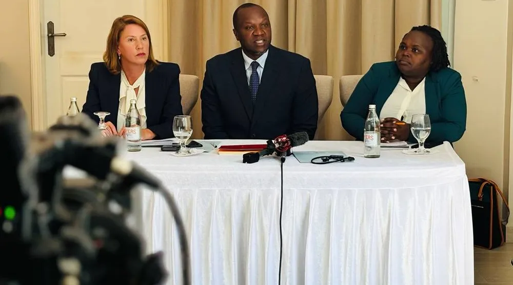  Lawyers Antonio Mulvay, left, and Willis Otieno, center, who are part of the legal team filing a law suit against Sudan's Rapid Support Forces (RSF) on behalf of Sudanese torture victims, speak to the media in Nairobi, Tuesday June 9, 2026. (AP) 