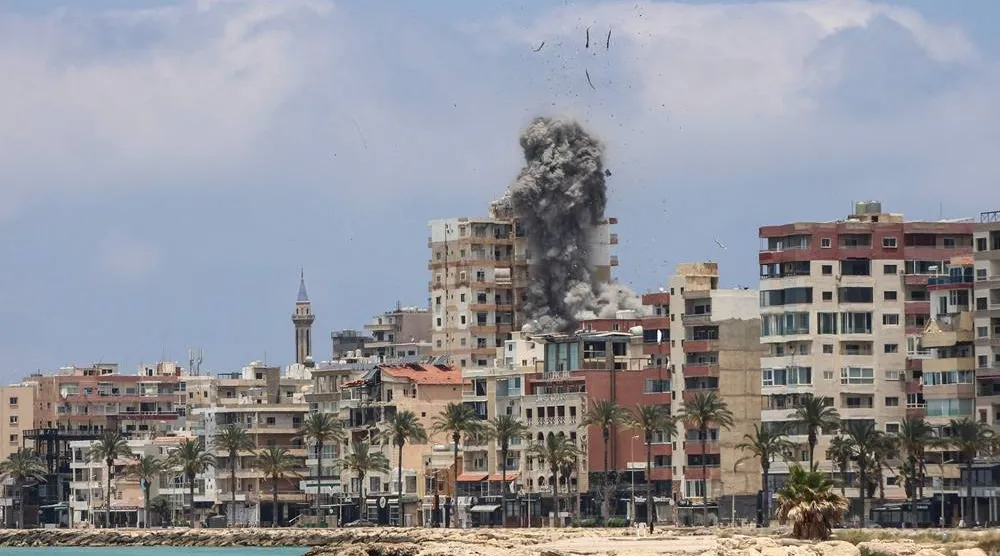 Smoke rises following an Israeli airstrike in the southern city of Tyre on June 9, 2026. (AFP)