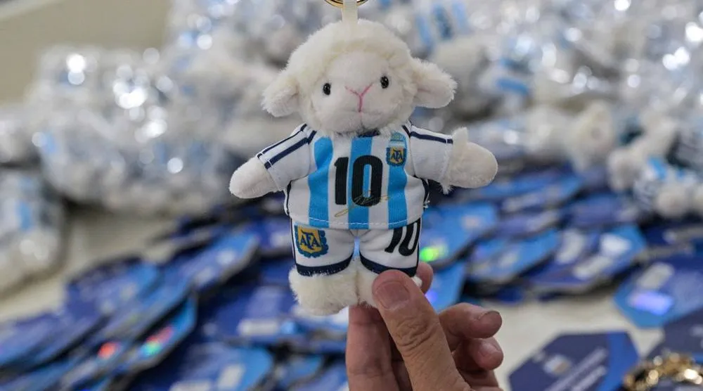 In this photo taken on June 5, 2026, a worker packs merchandise of Lionel Messi of Argentina's national football team, which will participate in the FIFA World Cup 2026, at the All Star Partner factory in Yiwu in eastern China's Zhejiang province.(AFP)