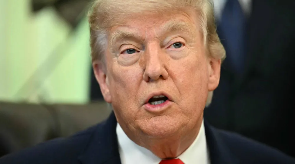 (FILES) US President Donald Trump speaks before signing a proclamation in the Oval Office of the White House in Washington, DC, on June 11, 2026. (Photo by Kent NISHIMURA / AFP)