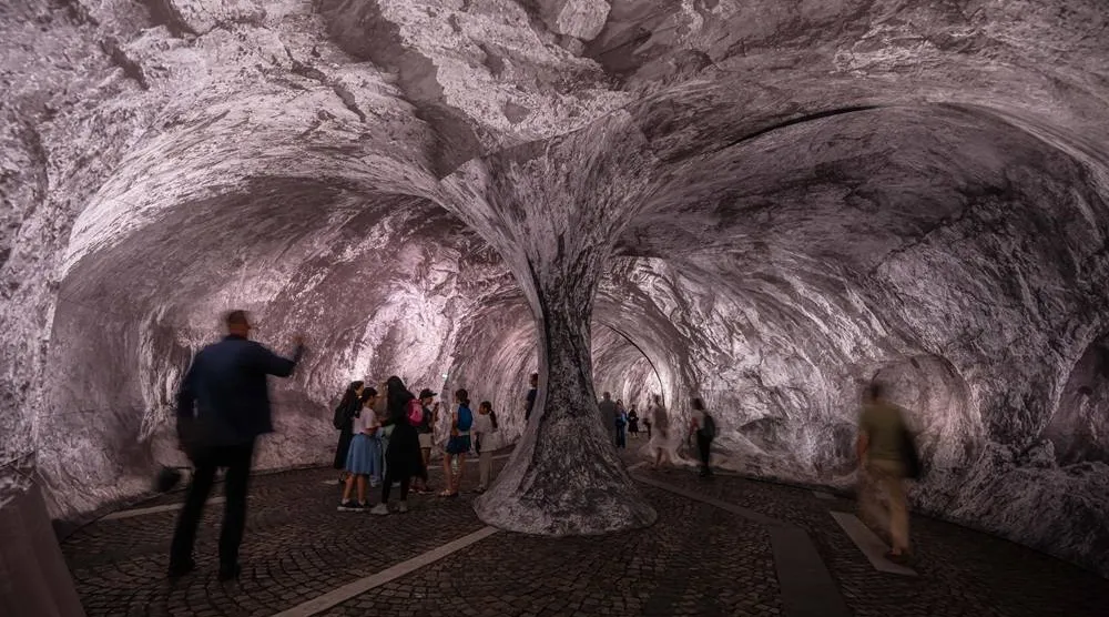  Visitors walk into the artwork "The Pont Neuf Cave" by French street artist JR on the Pont Neuf bridge, Tuesday, June 16, 2026, in Paris, open to the public from June 15 to 28. (AP)