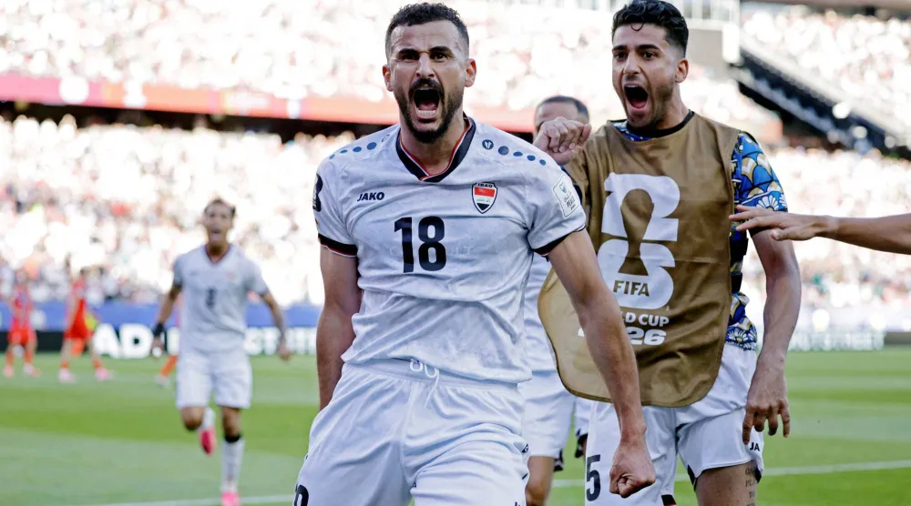 فرحة كبيرة للاعب العراقي أيمن حسين بعد هدفه في شباك النرويج (رويترز)