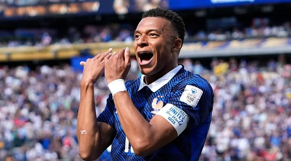 France's Kylian Mbappe celebrates after scoring the opening goal of his team during the World Cup Group I soccer match between France and Senegal in East Rutherford, N.J., near New York, Tuesday, June 16, 2026. (AP)