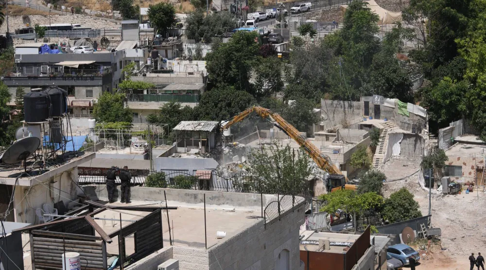هدمت السلطات الإسرائيلية منزلاً فلسطينياً في حي سلوان بالقدس الشرقية مايو الماضي (أ.ب)