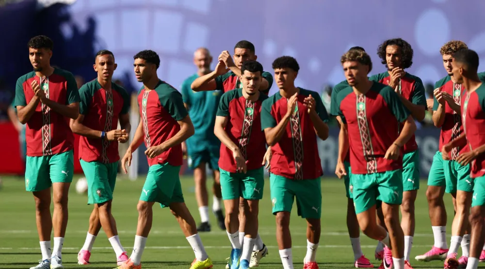 لاعبو المغرب خلال الإستعداد لمواجهة أسكتلندا المفصلية (ا ف ب)