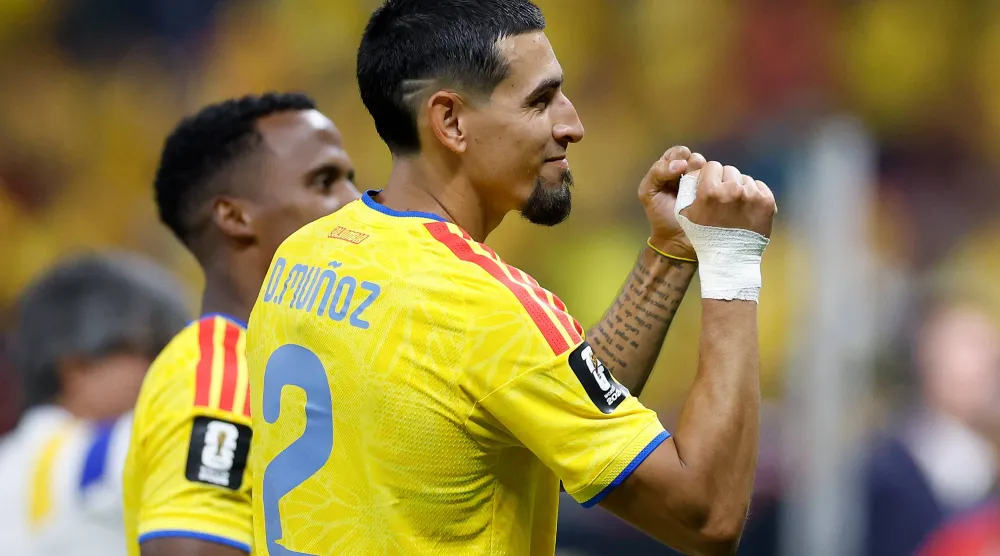 Colombia's defender #02 Daniel Munoz celebrates after winning the 2026 World Cup Group K football match between Colombia and Democratic Republic of Congo at the Guadalajara Stadium in Zapopan on June 23, 2026.  (Photo by Ulises RUIZ / AFP)