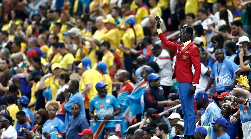 Democratic Republic of Congo's supporter Michel Kuka Mboladinga, pays tribute to Democratic Republic of Congo's late prime minister Patrice Lumumba, by remaining motionless ahead of the 2026 World Cup Group K football match between Colombia and Democratic Republic of Congo at the Guadalajara Stadium in Zapopan on June 23, 2026. (AFP) 